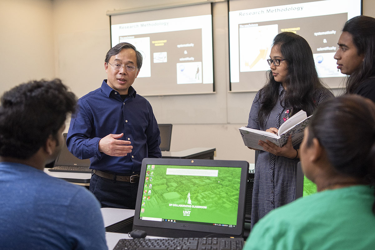 Dr. Junhua Ding and students